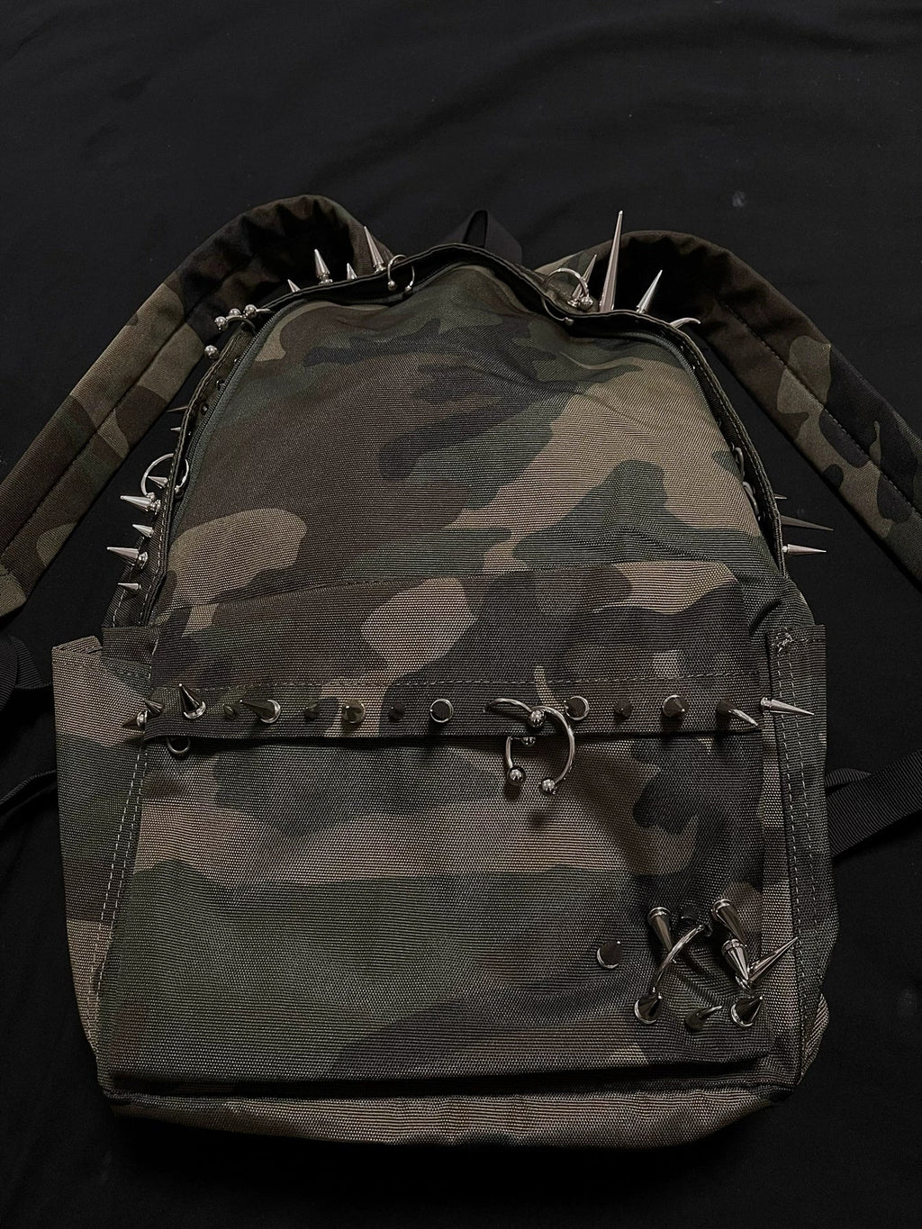 Pierced Camo Backpack