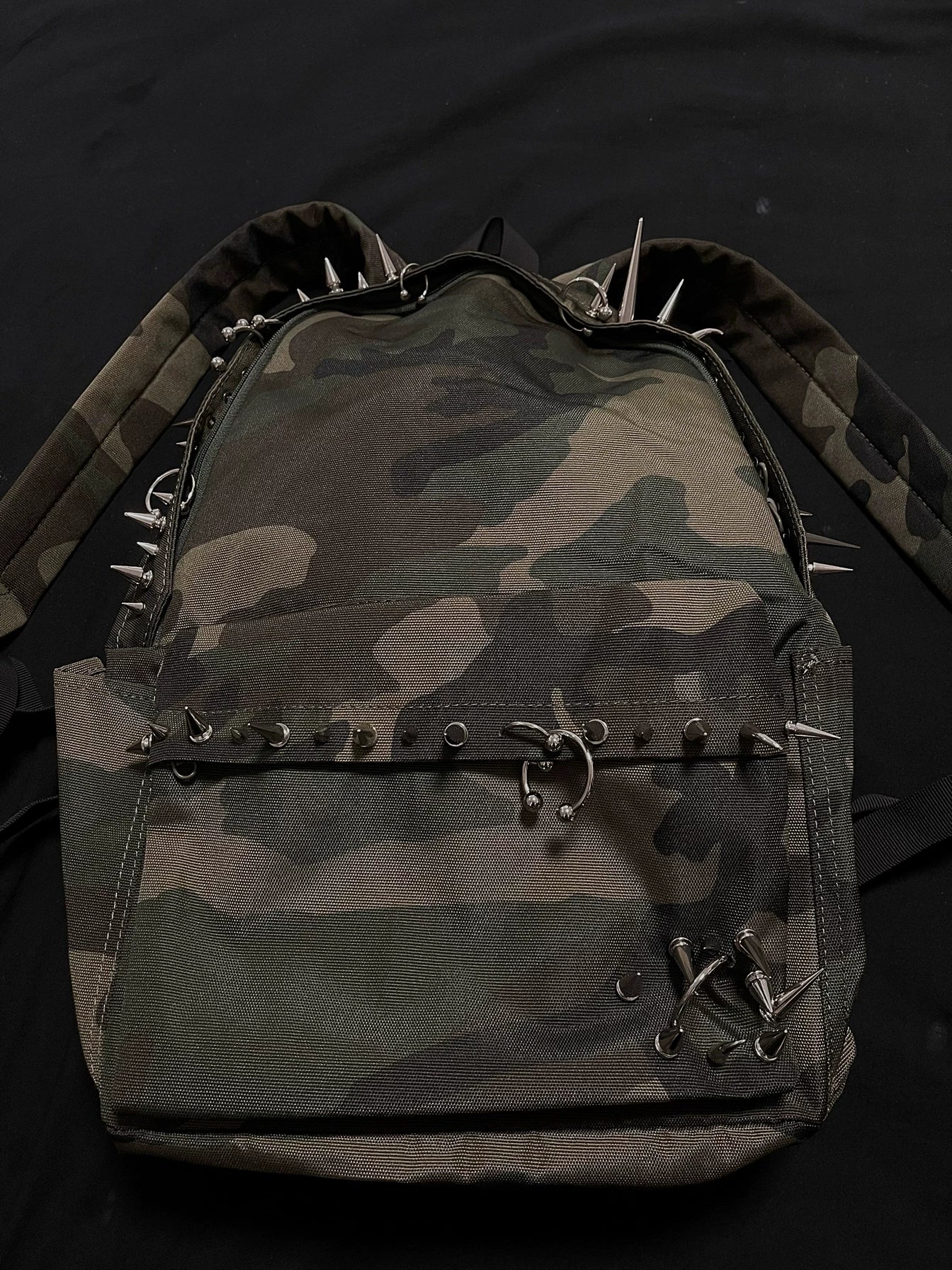 Pierced Camo Backpack