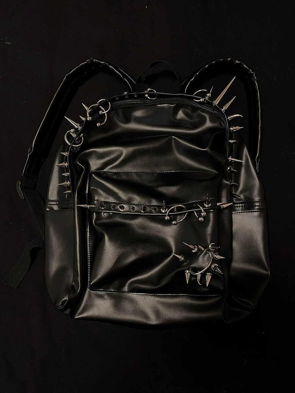 Pierced Leather Backpack