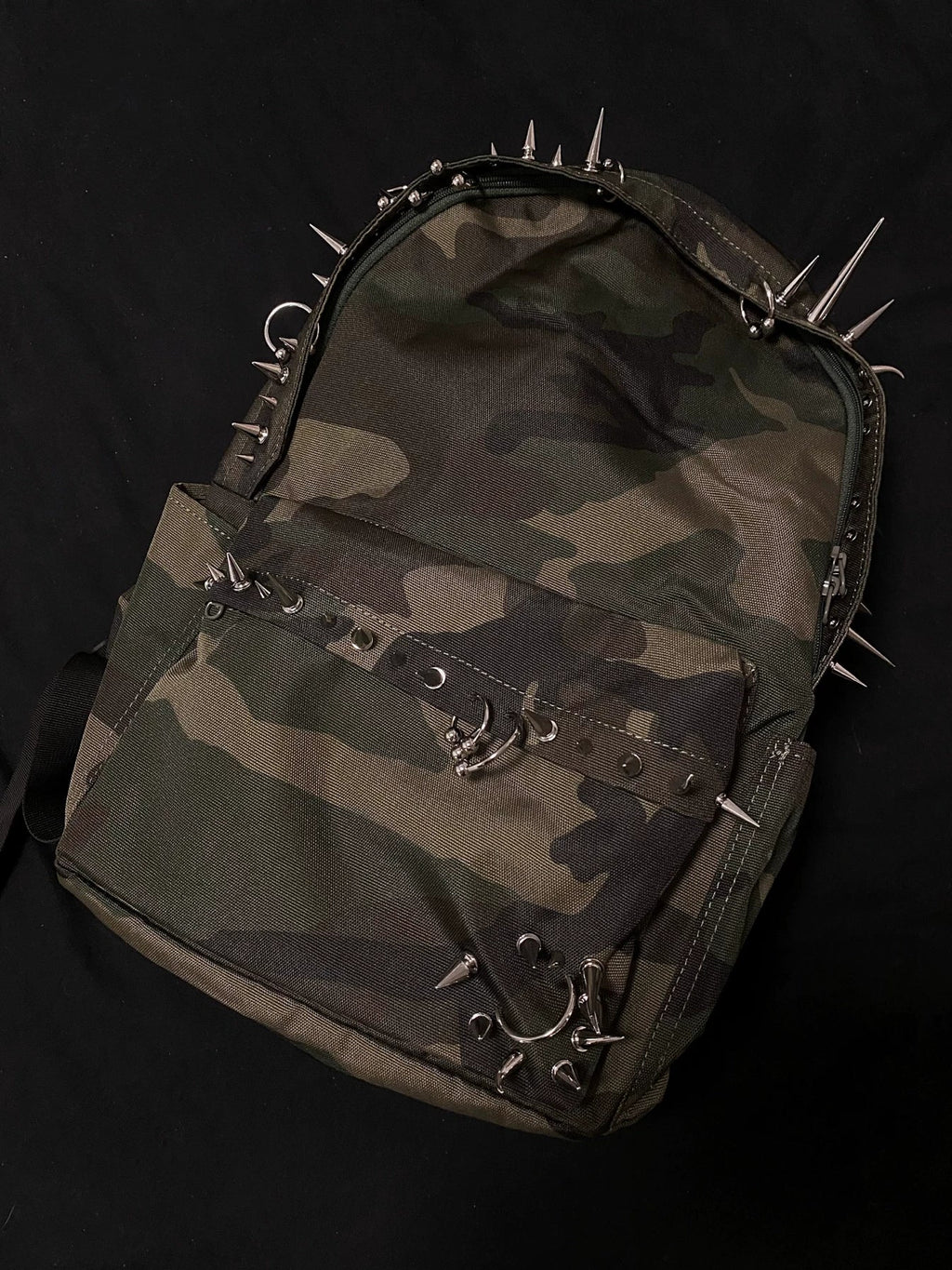 Pierced Camo Backpack