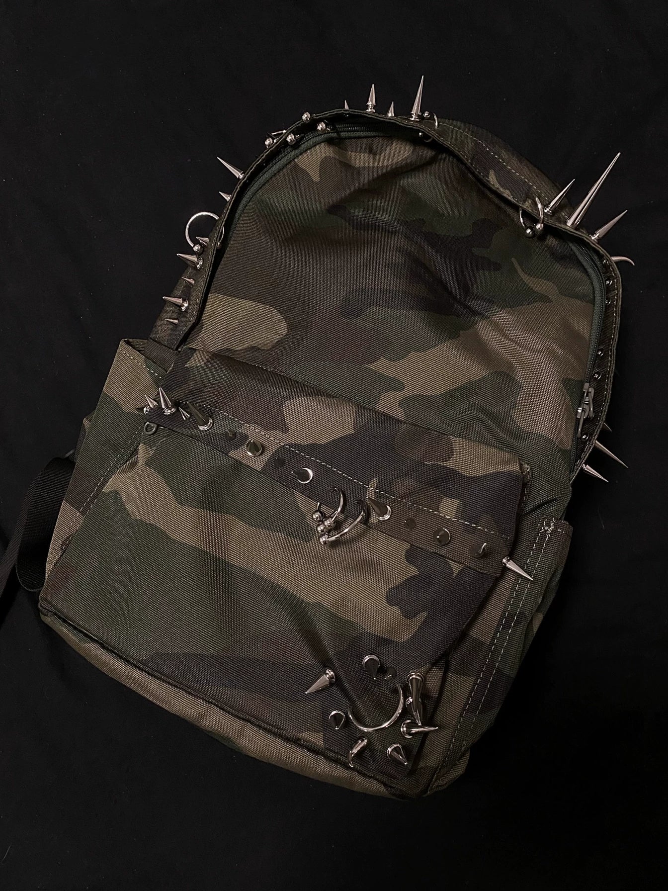 Pierced Camo Backpack