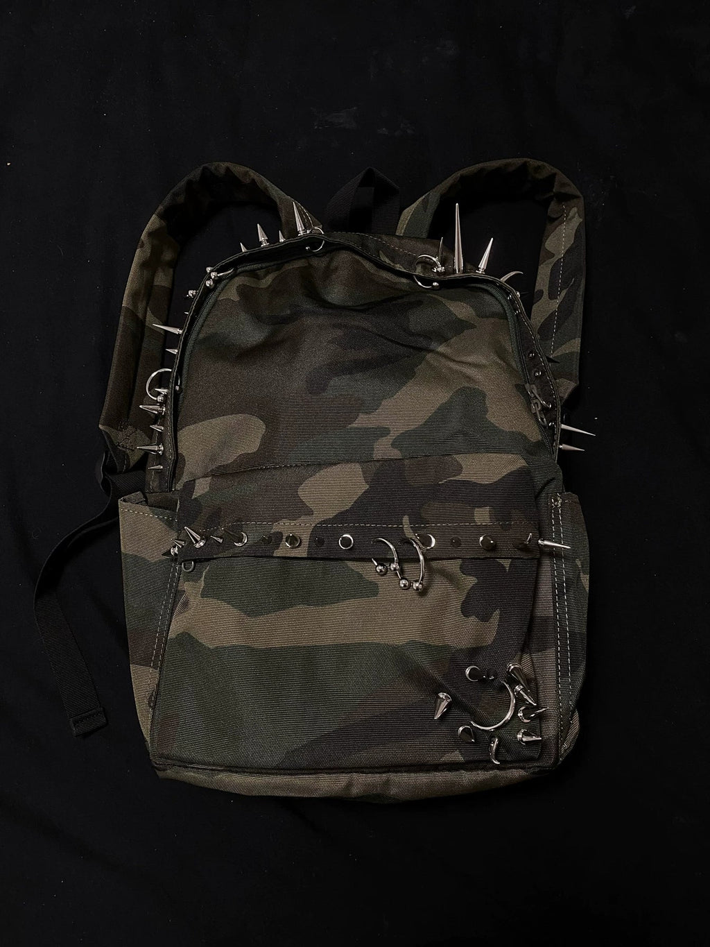 Pierced Camo Backpack