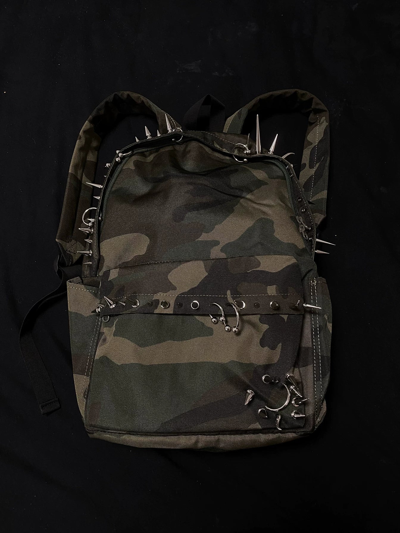 Pierced Camo Backpack