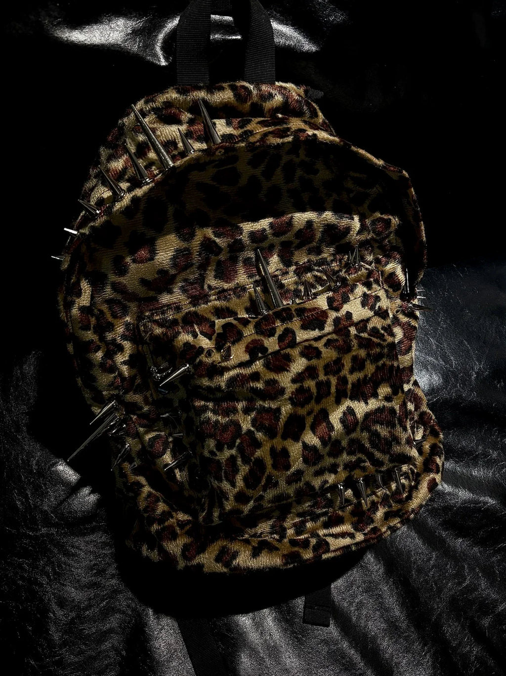 Pierced Leopard Backpack