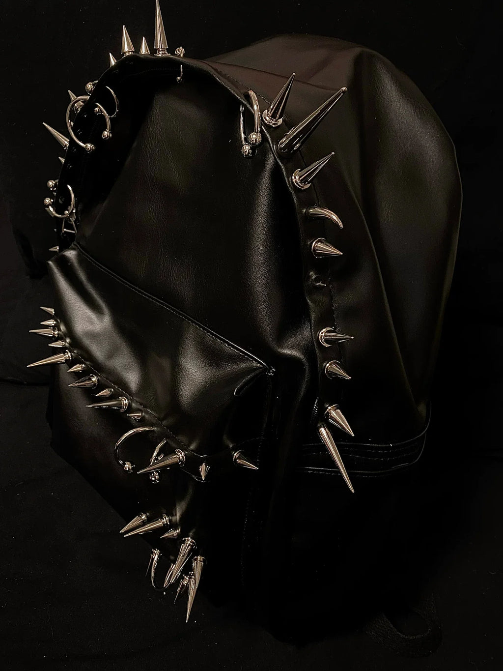 Pierced Leather Backpack