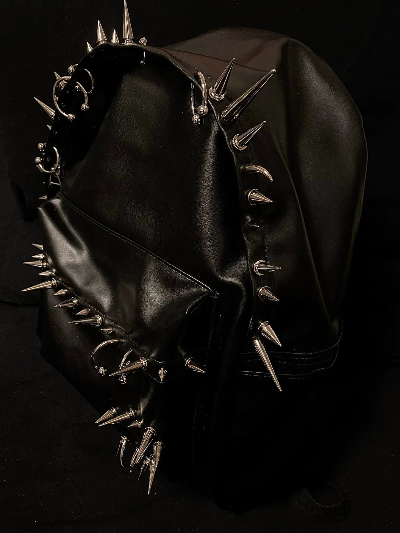 Pierced Leather Backpack