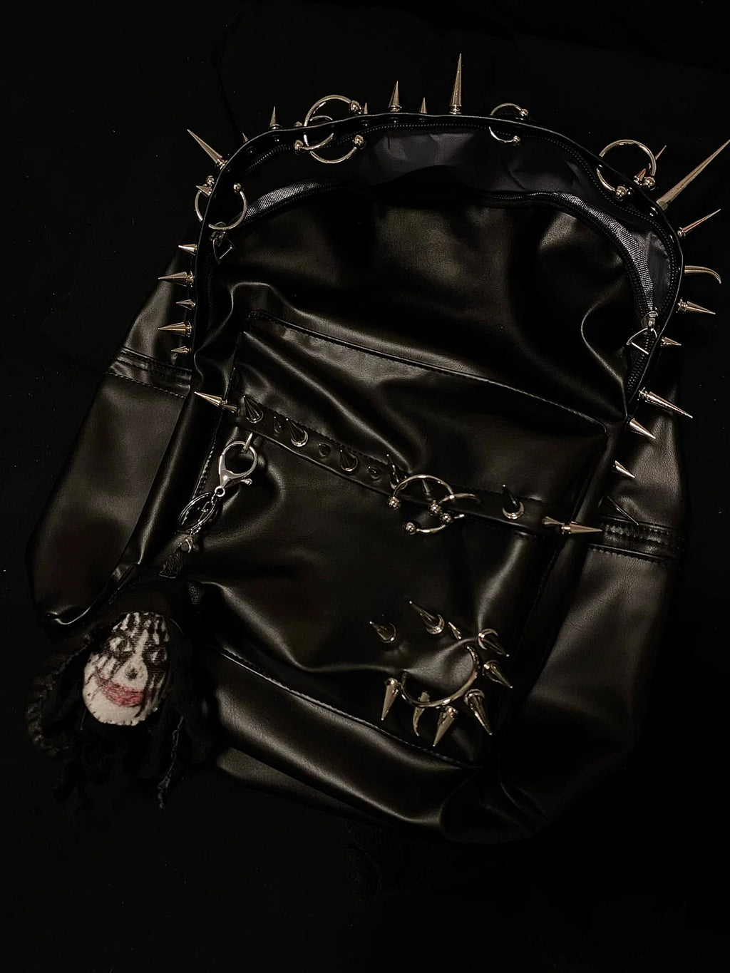 Pierced Leather Backpack