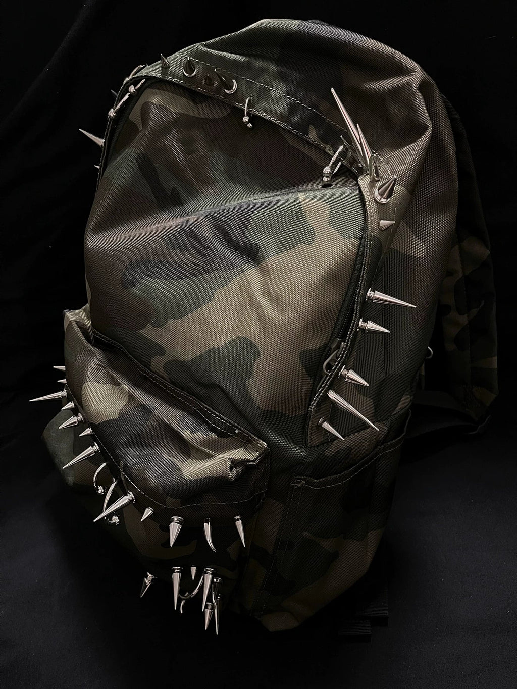 Pierced Camo Backpack