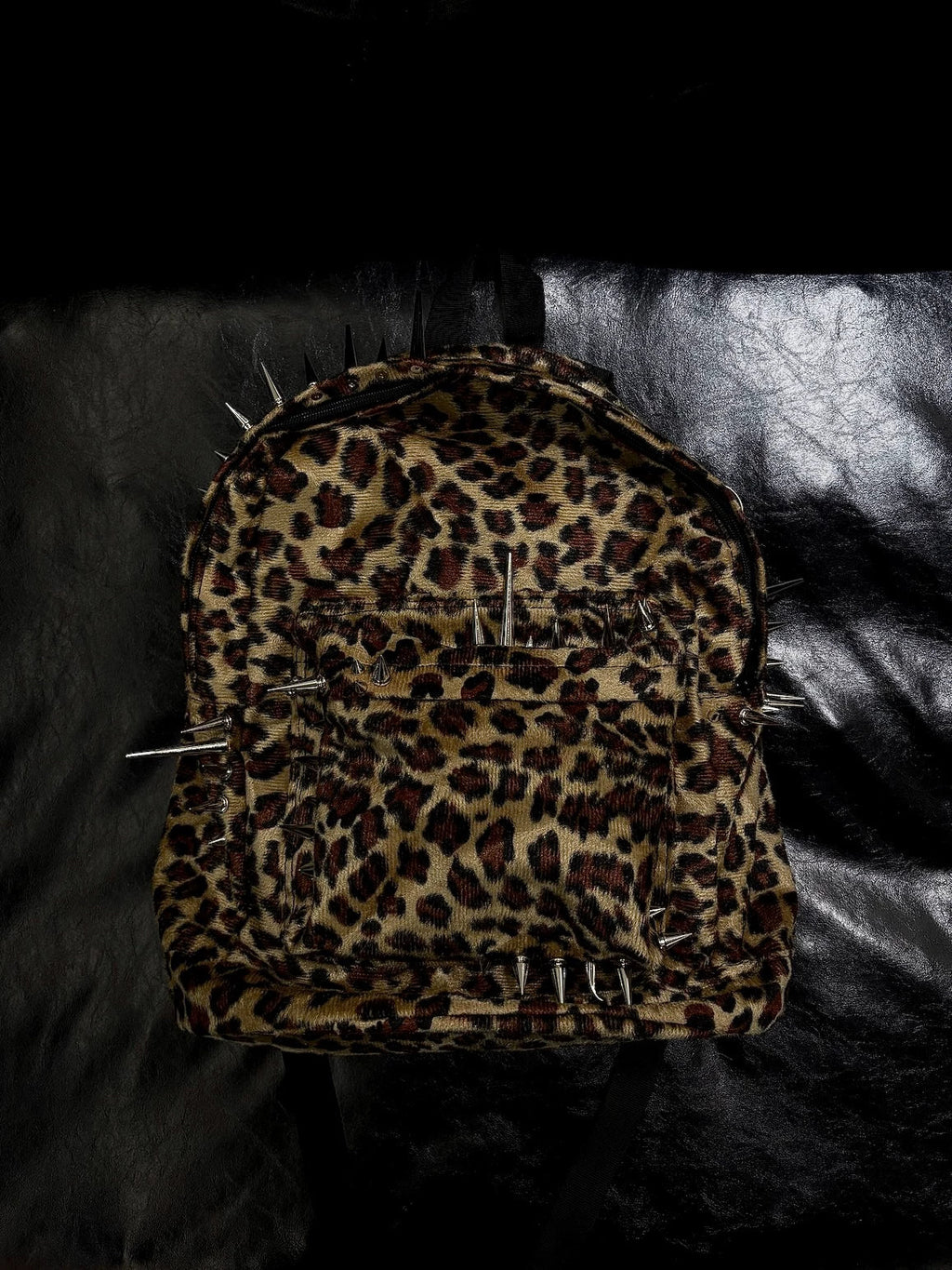 Pierced Leopard Backpack