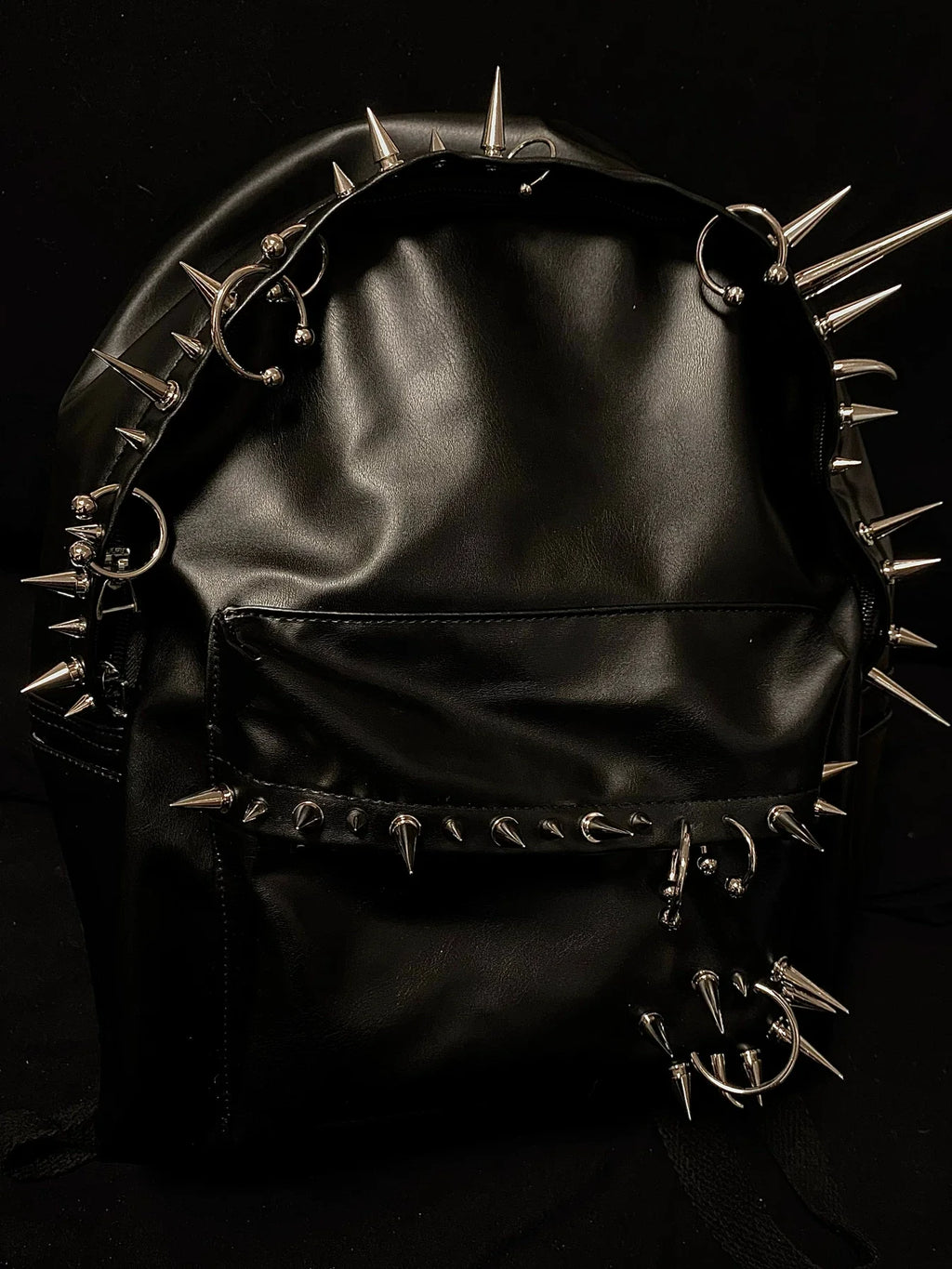 Pierced Leather Backpack
