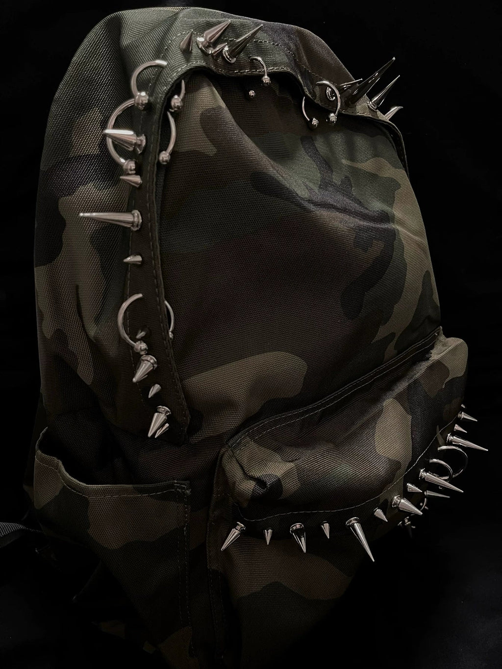 Pierced Camo Backpack