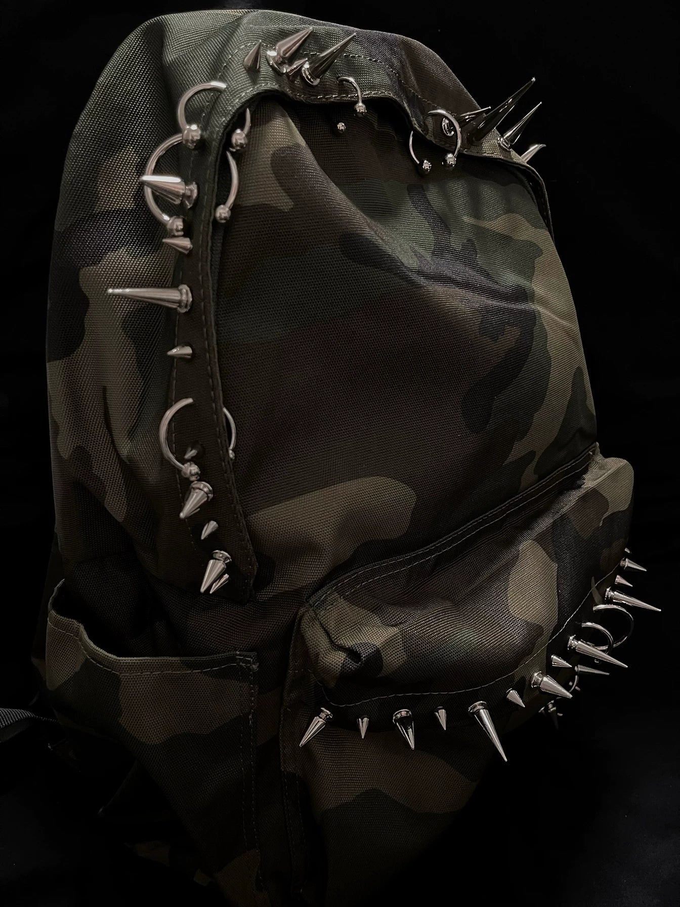Pierced Camo Backpack